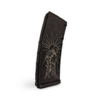 Black rifle magazine with engraved design on a white background