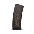Black rifle magazine with engraved design on a white background