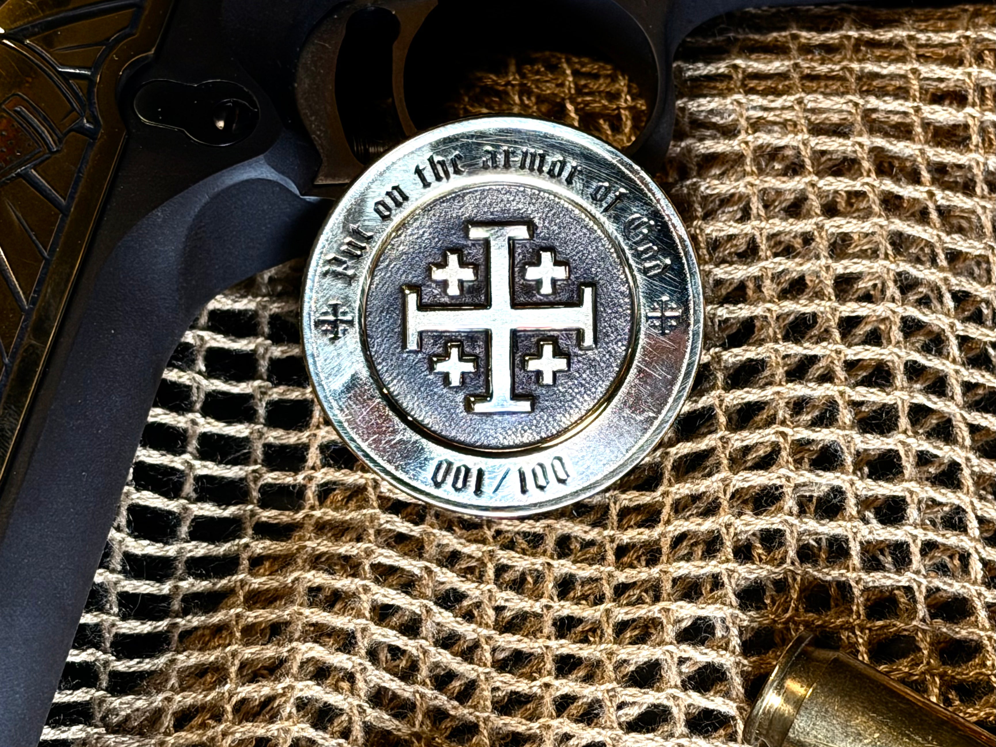 Limited edition Founders Club coin with Armor of God Jerusalem cross on a fur background. 