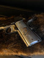 Custom 1911 laser engraved aluminum grips with a crusader design.