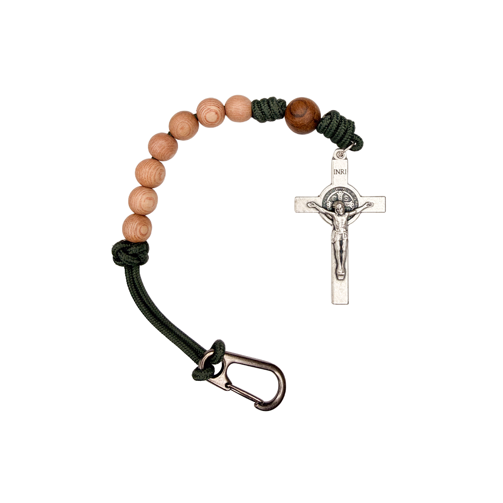 Bracelet with wooden beads and a metal cross on a white background
